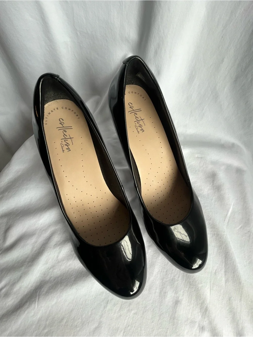 Clarks Black Patent Round-Toe Heel Pumps